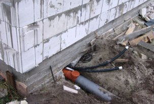 How to punch a hole in the foundation for a sewer