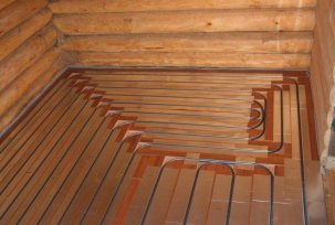 Do-it-yourself installation of a warm floor on a wooden floor