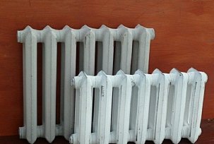 Dimensi dan daya termal radiator besi tuang