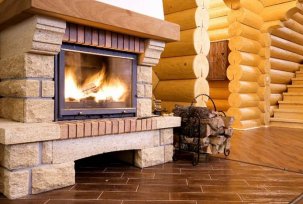 Choosing and installing a fireplace in wooden houses