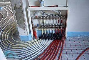 Installation of a water floor heating system in an apartment