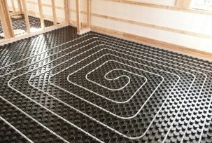 Laying scheme of a warm water floor with a snail