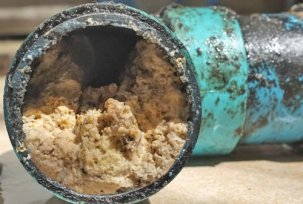 Mechanical methods for cleaning grease from sewer pipes