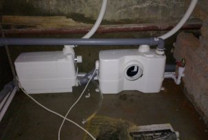 Features of installation of forced sewage in a private house